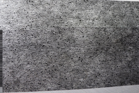 2. Overylay the powder active carbon on the surface of non woven fabric